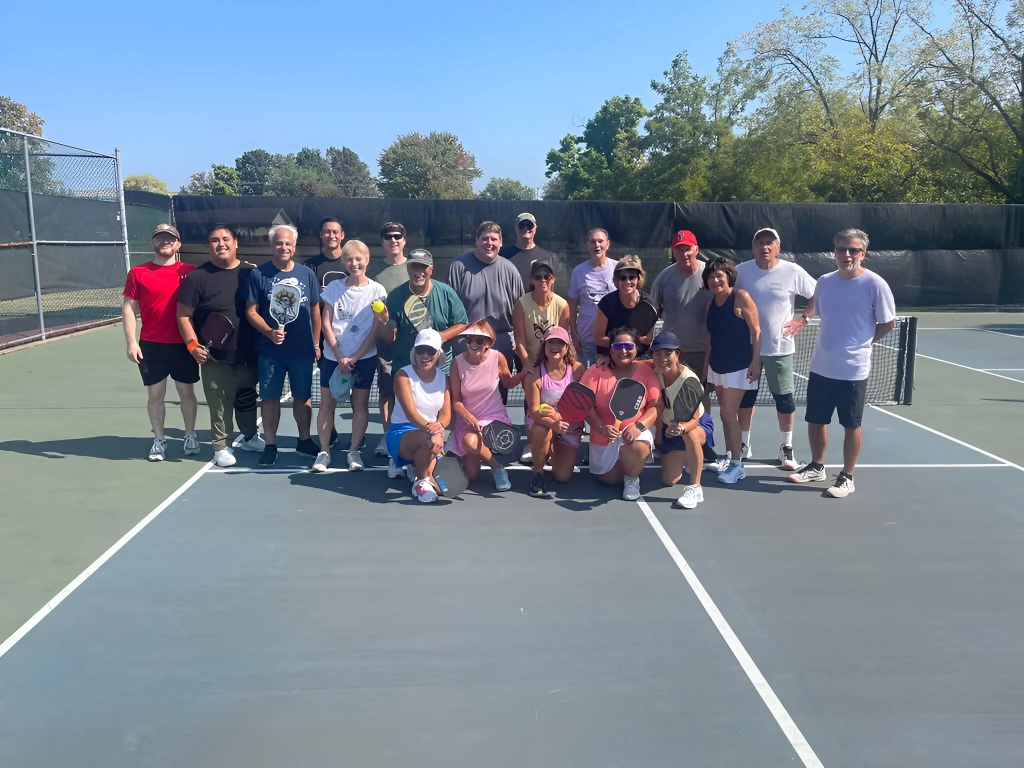 Players gather for refreshments and camaraderie after an engaging match at the Horsham Pickleball Club's 'All Levels' event.